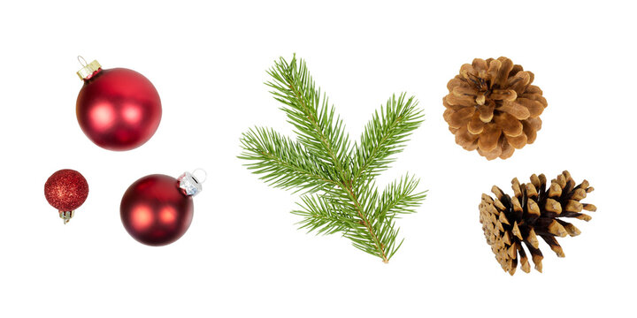 christmas decoration with red xmas balls, fir tree branch and pine cone isolated on white or transparent png