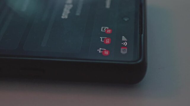 Close up of smartphone screen with unread notification counter numbers rapidly increasing, concept for digital detox, inbox zero and social media stress relief.