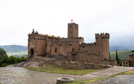 Javier Castle, a historic medieval fortress in Navarra, Spain, surrounded by the landscape of northern Spain.