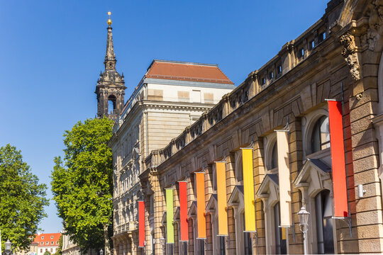 Colorful flags on the facade of the market hall in Dresden, Germany