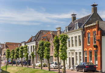Fototapeta premium Old houses on the dike in the center of Haastrecht, Netherlands