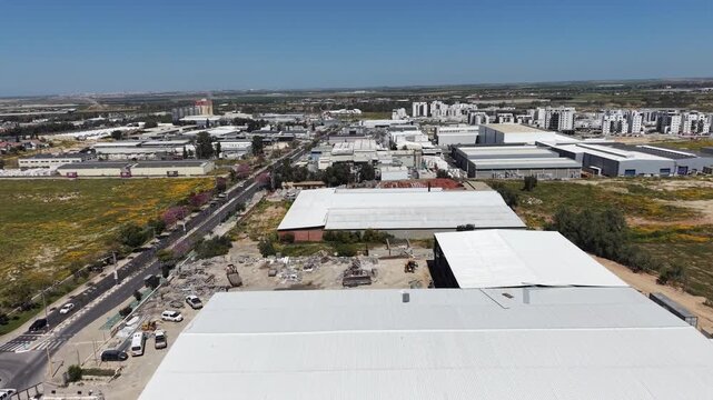 Aerial drone view of Ofakim city and industrial area in southern Israel with urban landscape and infrastructure