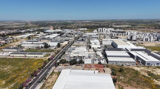 Aerial drone view of Ofakim city and industrial area in southern Israel with urban landscape and infrastructure