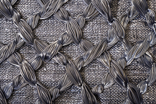 Luxury silver metallic embroidery thread texture background