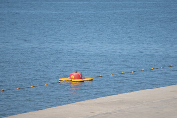 Floating safety buoy with warning light on calm water in South Korea © hushfilm