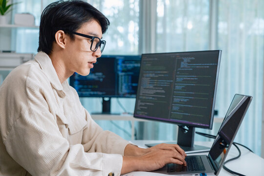 Developer software programmer computer coding screen working technology engineering monitor at modern workspace