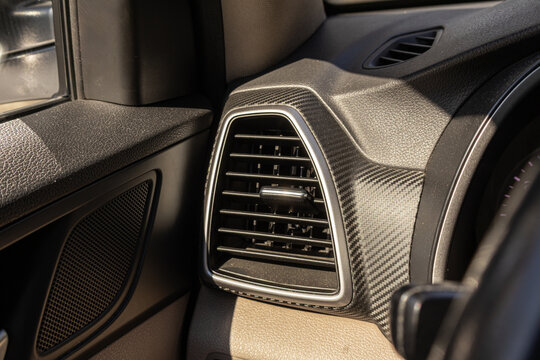 Close-Up of Dashboard Air Vent and Speaker Panel