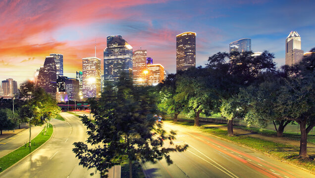 Houston Texas Skyline with modern skyscrapers and blue sky view from park river US