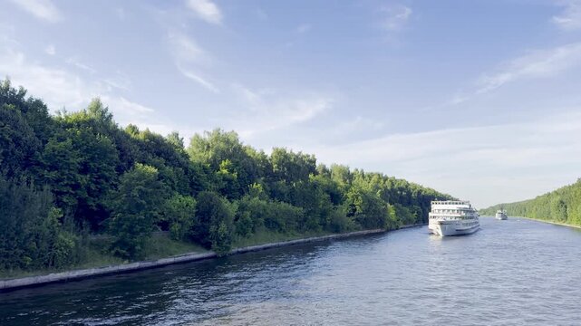 Volga River, Volga-Don Canal, Russia, August 7, 2026, several passenger cruise ships following each other along the scenic canal in clear summer weather.