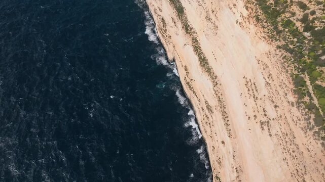 Aerial Flyover of White Coastal Cliffs and Mediterranean Sea, dingli cliffs Malta