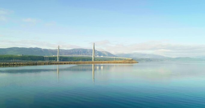 Drone View of Helgeland Cable-Stayed Bridge Reflected in Leirfjorden, Norway