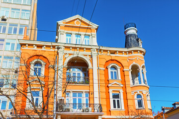 Fototapeta premium Facade of the historic Georgov House showcases ornate Neo-Baroque architecture in Sofia, Bulgaria. Distinctive Crown house rises against sky in Sofia city