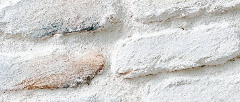 weathered whitewashed brick wall texture with peeling plaster and rustic patina for authentic sustainable interior design web banners advertising backgrounds editorial layouts

