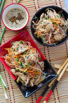 Stir-fried glass noodles with pork and vegetables.