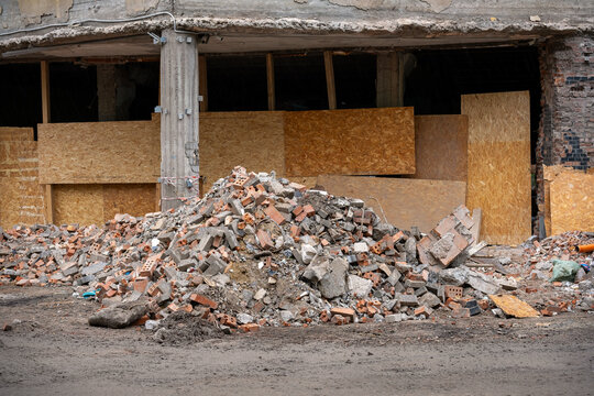 Pile of brick rubble at demolished building site