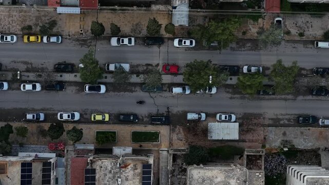 Drone view of a city landscape in Aleppo, Syria. Urban skyline and residential neighborhoods from above. City streets, infrastructure, and middle eastern architecture.