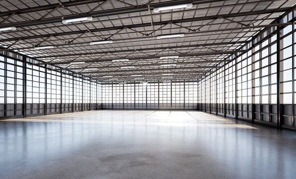 Empty factory interior filled with natural light