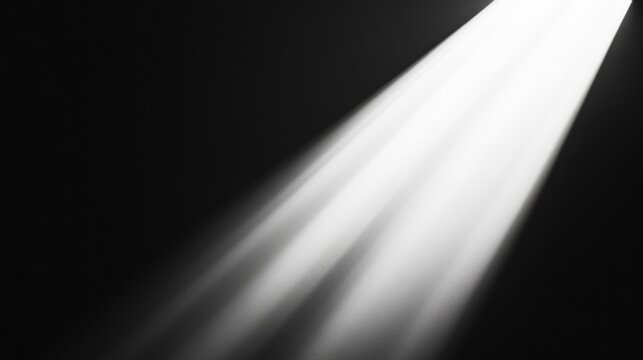 Bright white light beam cutting through darkness spotlight