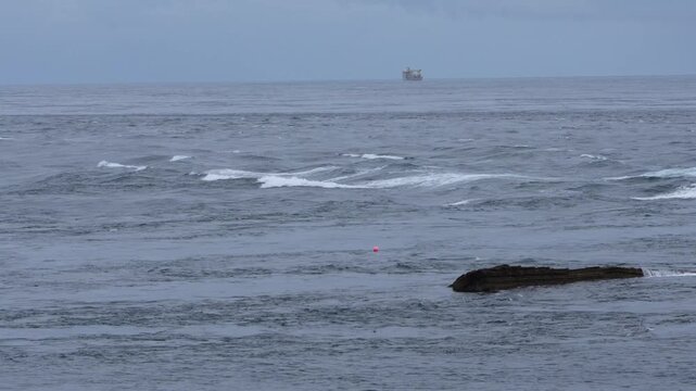 Powerful tide ripping past Swona in Orkney in the Pentland firth