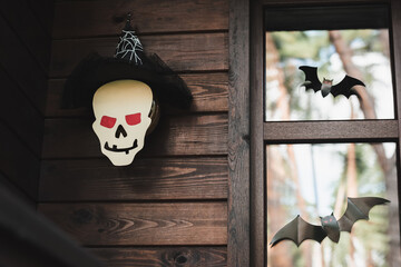 Fototapeta premium Creative Halloween decor enhances a cozy porch for spooky season