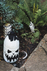 Fototapeta premium Creative Halloween decorations fill a porch with spooky vibes