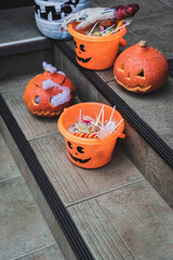 Fototapeta premium Spooky Halloween porch decor sets the mood for trick-or-treaters