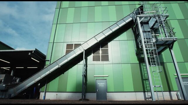 Steel conveyor rising to the boiler house of a heating plant