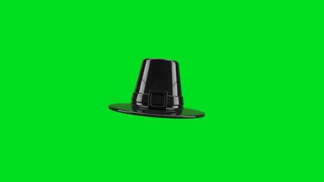 A glossy black pilgrim hat isolated on a vibrant green screen background