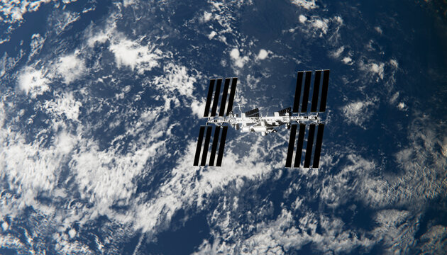A manned orbiting research facility orbits earth with solar panels