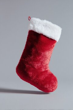 Festive red Christmas stocking hanging.