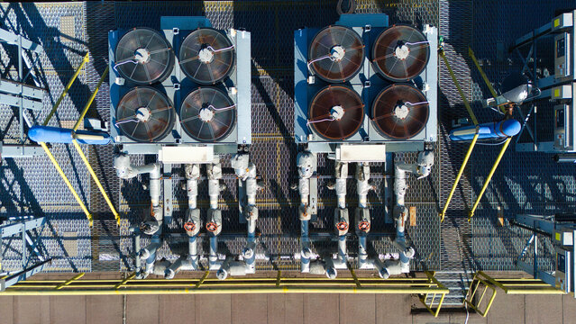Top Down Aerial View of Industrial HVAC Chillers and AI Cooling Units on Roof