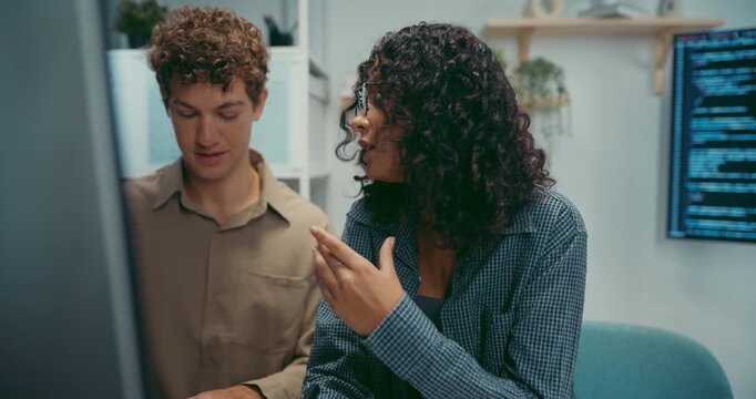 Diverse team software developer discuss AI coding and project strategy at office. Creative startup group brainstorming, Mentor code review training, Digital communication innovation strategy concept.