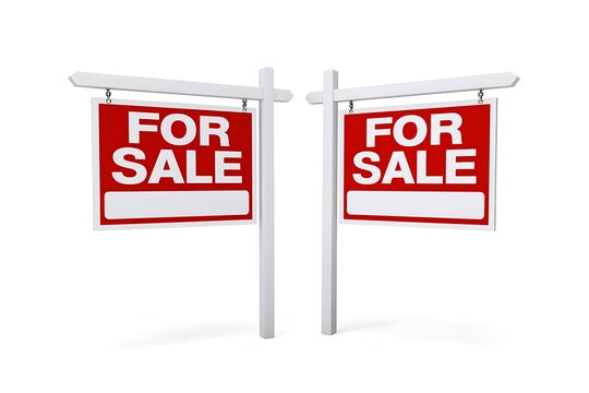 Two real estate for sale signs isolated on white background