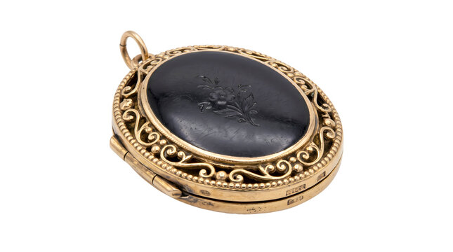 Antique gold locket with dark enamel face engraved with floral design for jewelry.