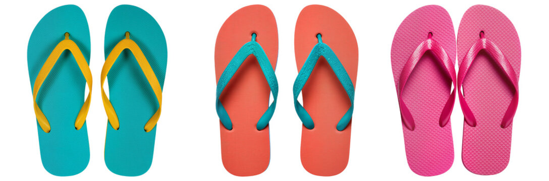 Three pairs of colorful flip-flops isolated on a white background