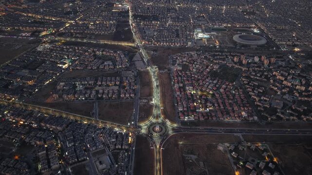 Drone view of a city landscape in Aleppo, Syria. Urban skyline and residential neighborhoods from above. City streets, infrastructure, and middle eastern architecture.