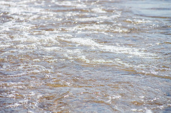 Soft wave of sea on sandy beach. Background.