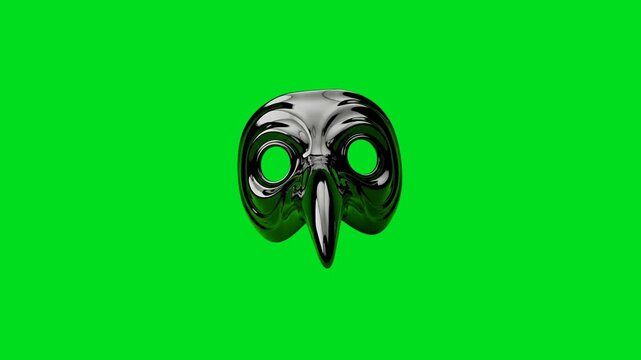 A shiny black bird-like plague doctor mask isolated on a bright green background