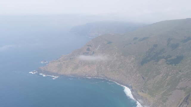 Aerial footage showcasing the dramatic cliffs and rugged coastline around Garita da Herbeira, near Meizoso, Spain.