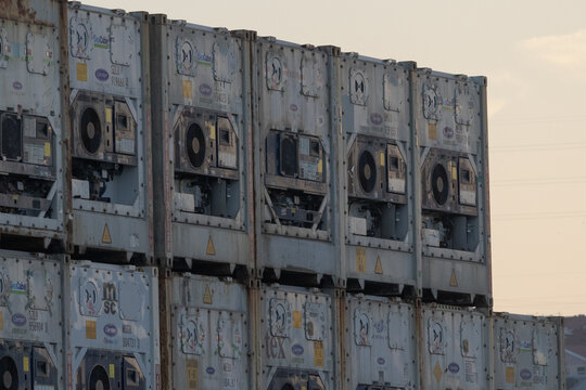 Stacked reefer shipping containers for global cold chain logistics