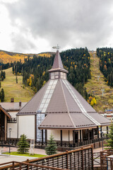 Obraz premium resort square with pavilion and cable car slope in Arkhyz mountains Russia.