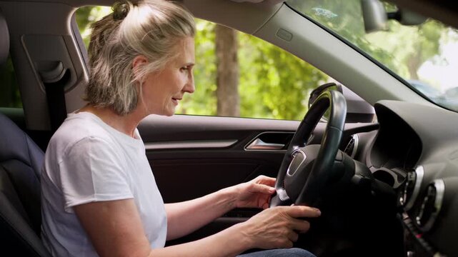 Annoyed irritated Caucasian old senior woman start engine failed in car rental auto own automobile mature retired lady feeling angry with broken vehicle repair problem aged female test drive failure