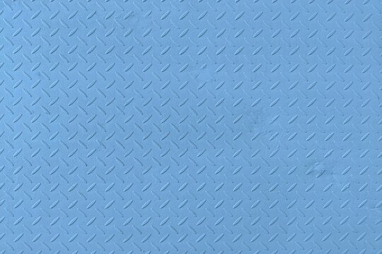 Blue painted metal diamond plate texture background