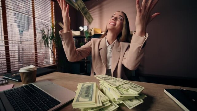 Satisfied happy Caucasian business woman throwing money rain flying banknotes at office table smiling female girl businesswoman throw dollars rejoicing with financial success executive win finance