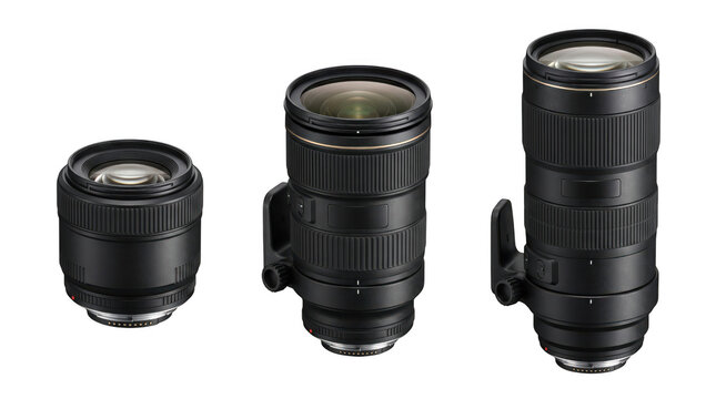 Three professional black camera lenses of different sizes standing upright a clean as transparent object
