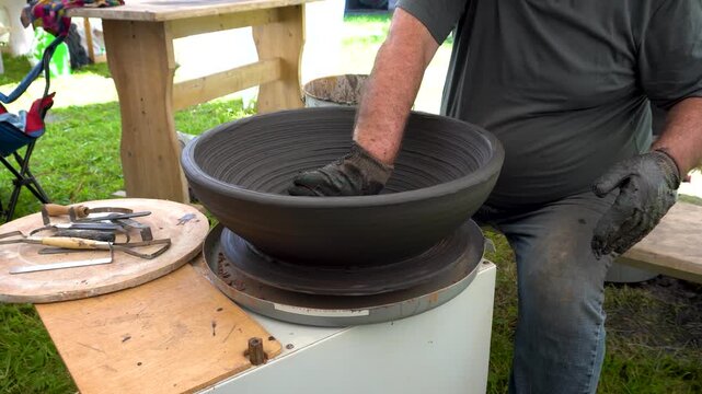 Potter working on a pottery wheel