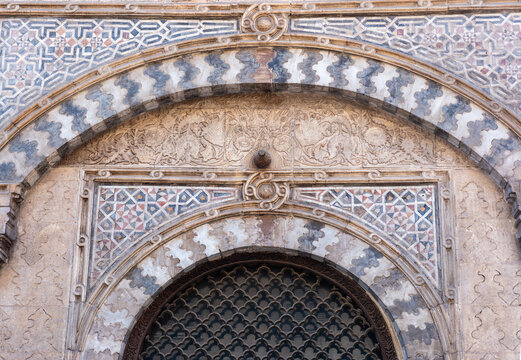 View of the intricate stone carvings and geometric patterns on the arched facade of the Sabil-Kuttab of Abdel Rahman Katkhuda in El-Gamaleya, Cairo Governorate, Egypt.