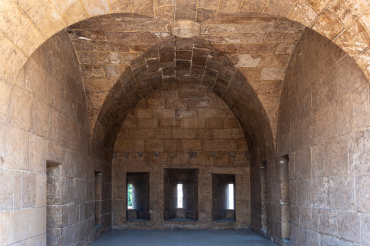 View of the historic stone vaulted interior and narrow embrasures of the Bab al-Futuh gate in El-Gamaleya, Cairo Governorate, Egypt.
