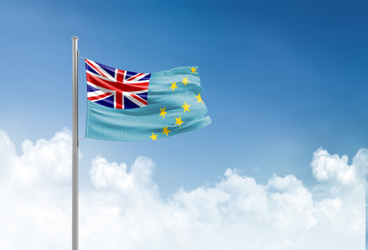 Tuvalu flag waving in beautiful sky.