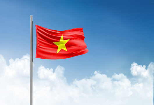 Vietnam flag waving in beautiful sky.